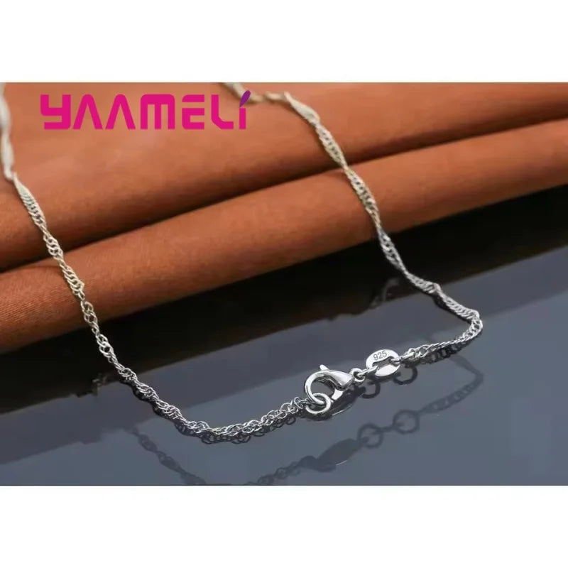Set pendente e orecchini a cerchio in argento 925