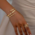 Gouden geometrische armband & ring set