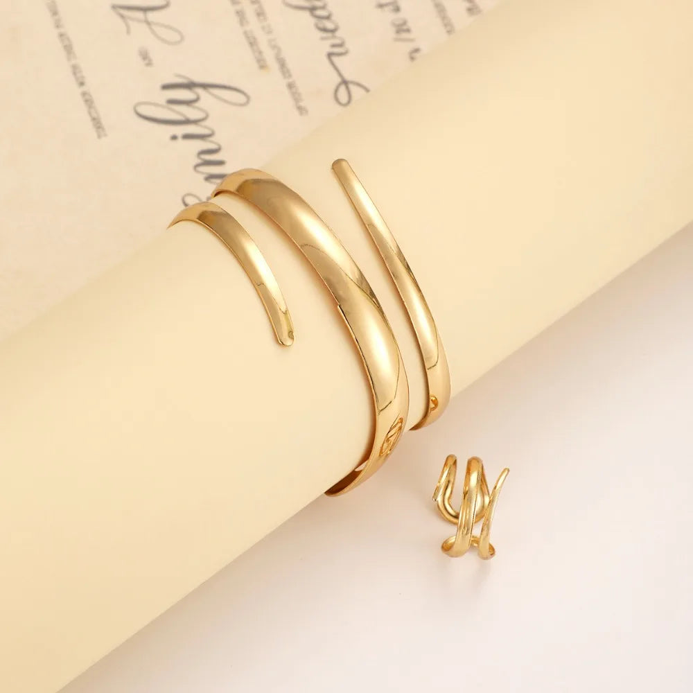 Gouden geometrische armband & ring set